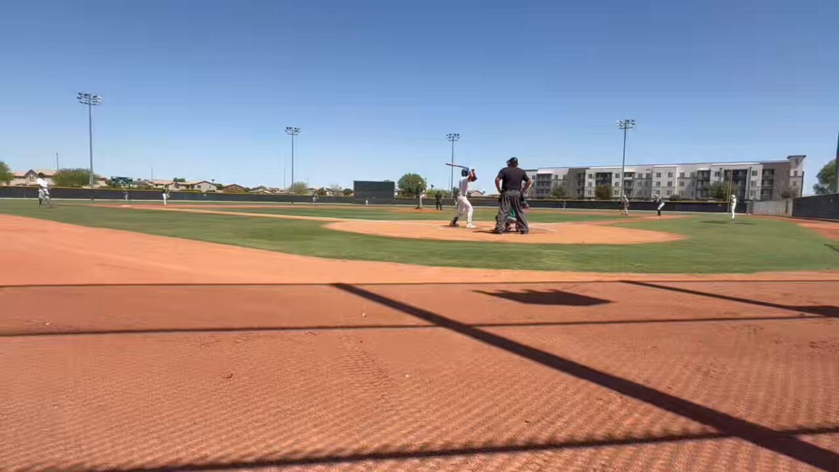 Baseball game in progress at the plate