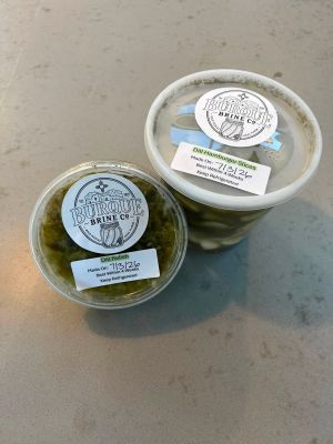Labeled Burque Brine dill relish and dill hamburger slices